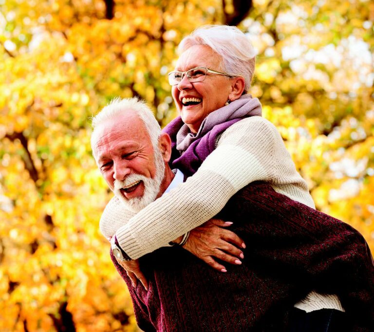 A senior couple in a park